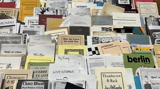 Selection of zines found in a bookshop - Image from Wikimedia Commons - Magpieturtle, CC BY 4.0 <https://creativecommons.org/licenses/by/4.0>, via Wikimedia Commons