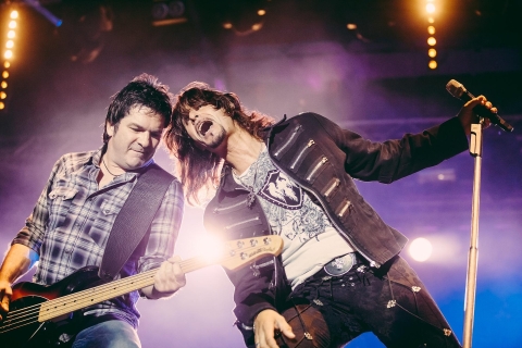 Two rockstars on stage - from Pixabay, https://pixabay.com/photos/tape-artist-music-skirt-gotthard-2264972/