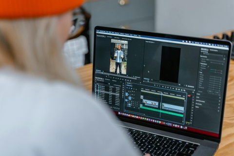 Video editing, from Pexels - https://www.pexels.com/photo/doing-business-using-a-laptop-7679465/