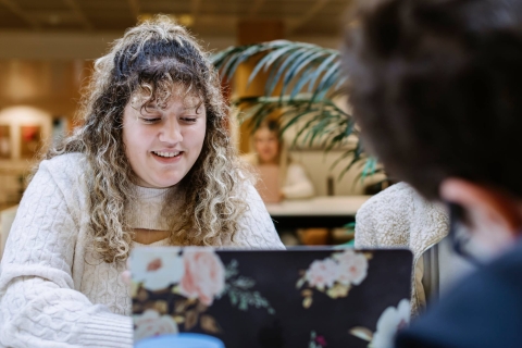 Student working with friends