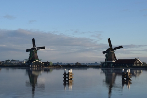 Windmills and their reflections in a body of water - from Pixabay - https://pixabay.com/photos/mill-lake-reflection-netherlands-1733286/