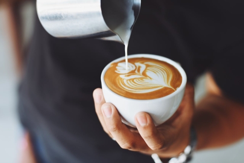 Cafe latte being poured