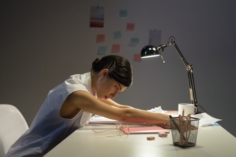 Woman stretching - From Pexels - https://www.pexels.com/photo/female-office-worker-stretching-on-top-of-her-desk-9063398/