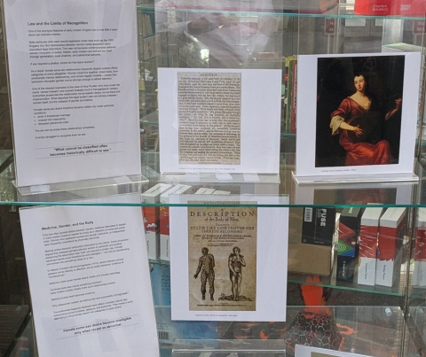 Photographs of a student display on historical representation of lesbians