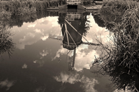 Reflection in water of a Dutch windmill. From Pixabay - https://pixabay.com/photos/windmill-dutch-holland-historic-1537634/