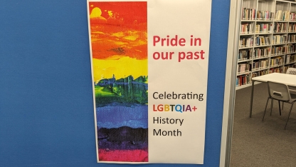 Poster with rainbow design.  Caption reads: Pride in our past - celebrating LGBTQIA+ History Month