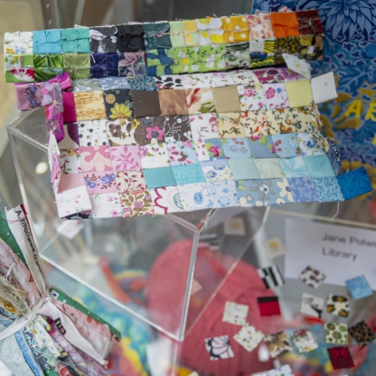 Collage of sewn fabric squares