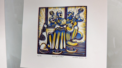 Linocut prints and a folding book