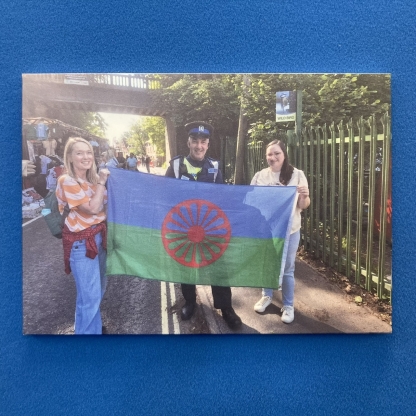 Dr Annabel Tremlett with a police officer and another Cushty Pompey supporter holding a Roma flag