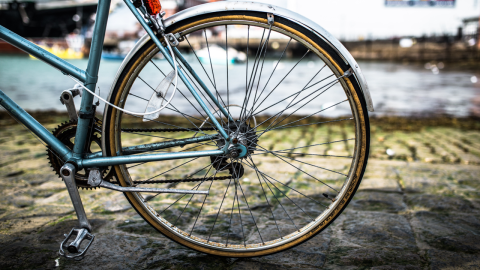 A photograph of a bicycle filling the full frame naturally, with balanced proportions and no distortion.