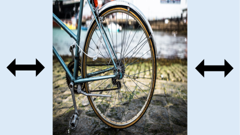 A photograph of a bicycle that has been horizontally squashed, making the subject appear unnaturally narrow and tall. Arrows on either side indicate the image has been compressed inward.