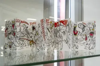 Leporello depicting anthropomorphic animals fighting