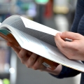 A close up of opened book from its side