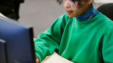 student using computer workstation